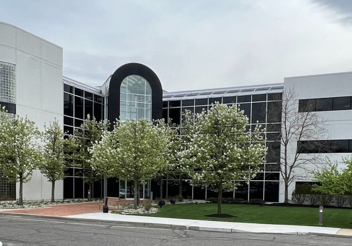 A building with trees in front of it